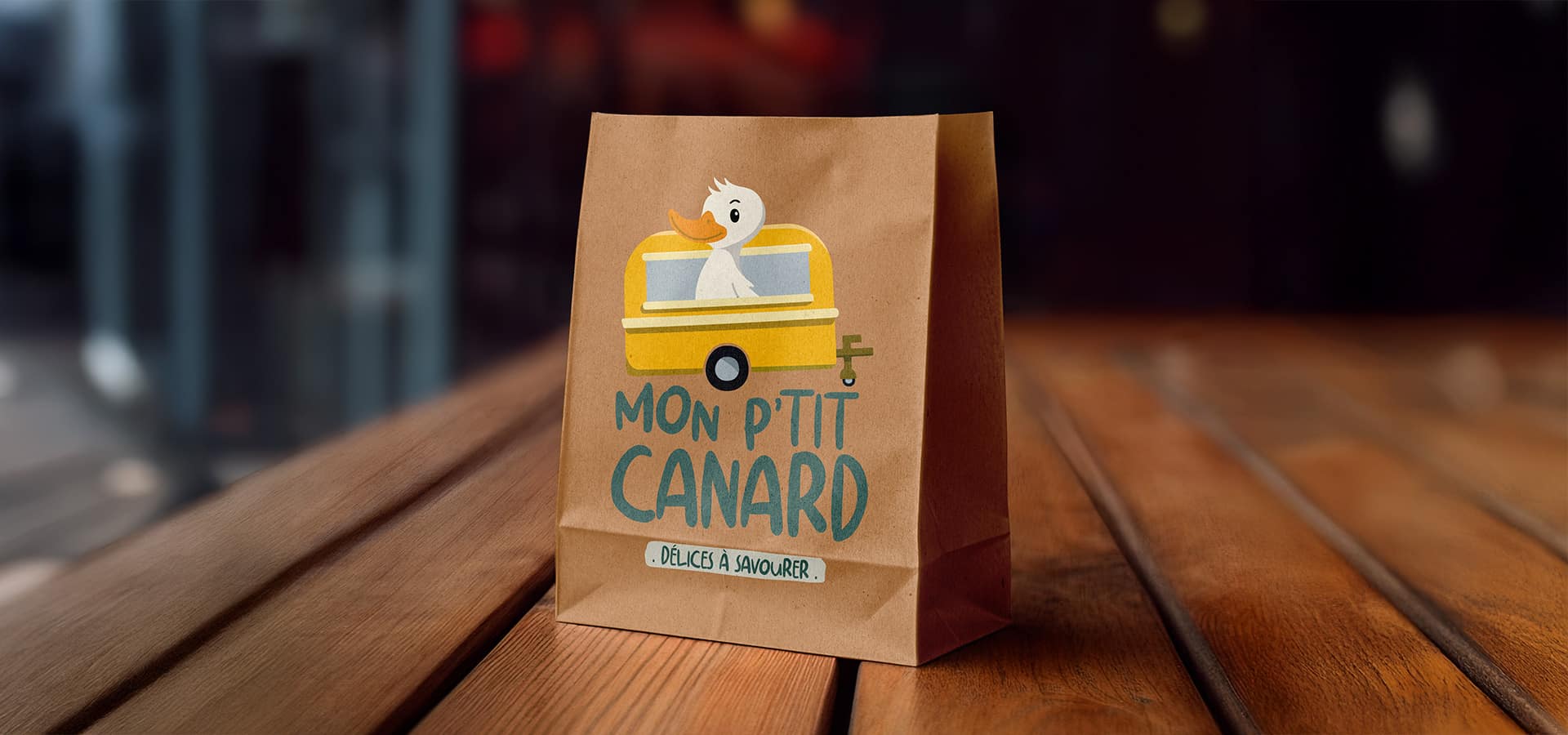 Sac en papier avec illustration de canard mignon.